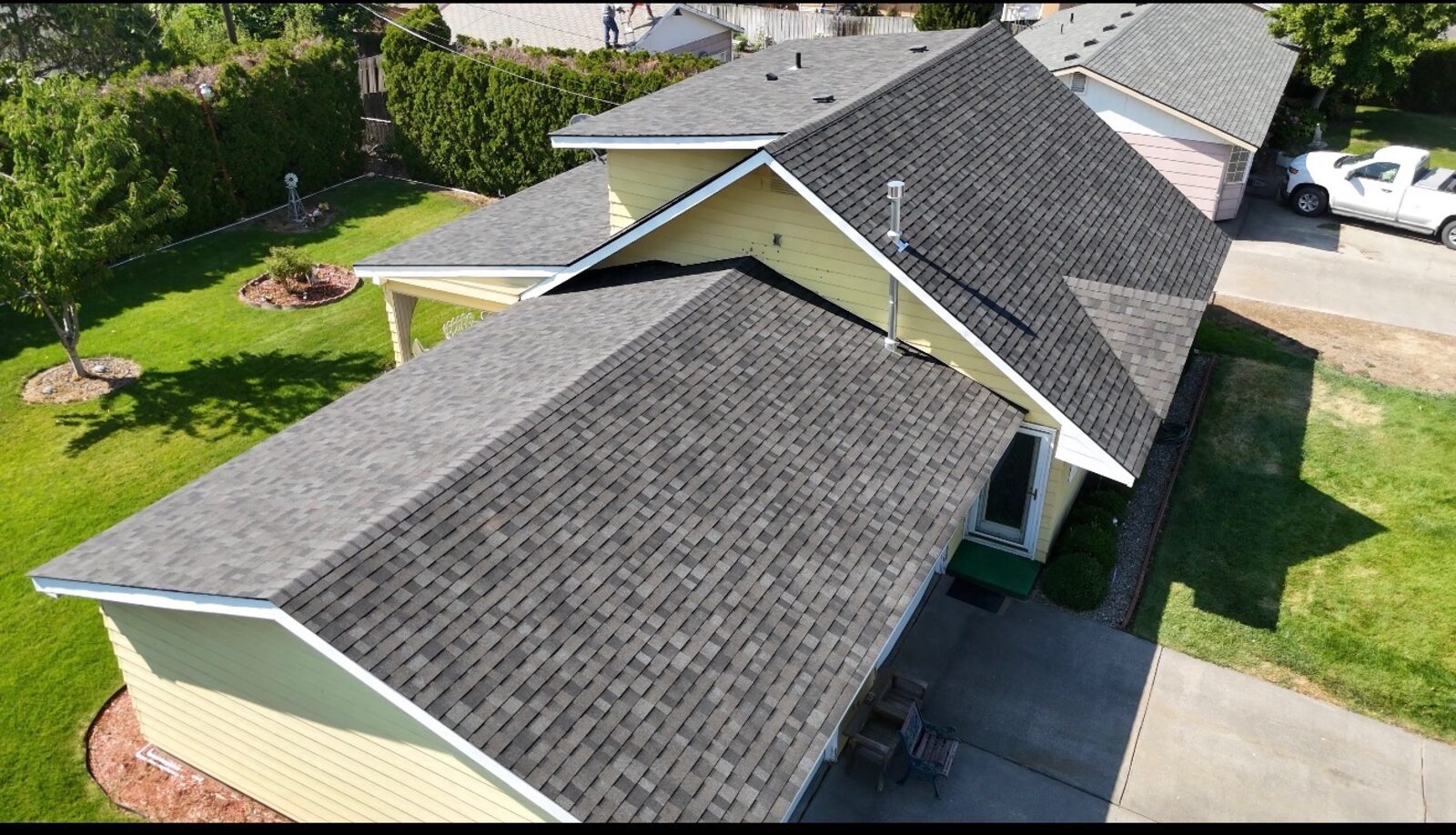 Completed architectural shingle roof by New Legacy Services