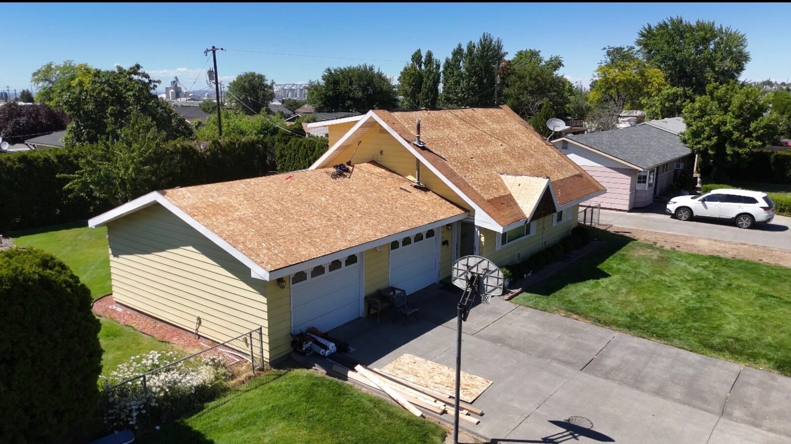 Fresh plywood decking installed before shingles